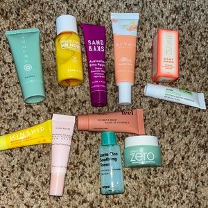 Various face cleansers and lotion samples.